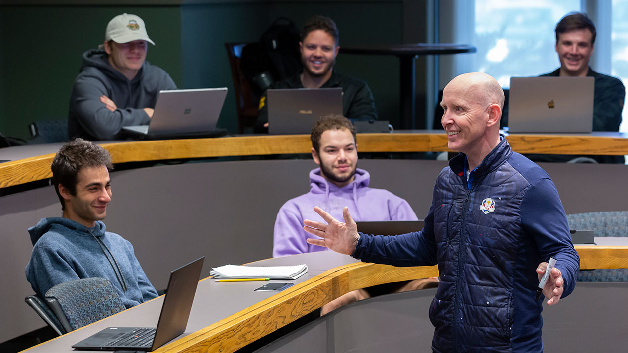 Students attending a lecture about the Business of Sports at Olin University