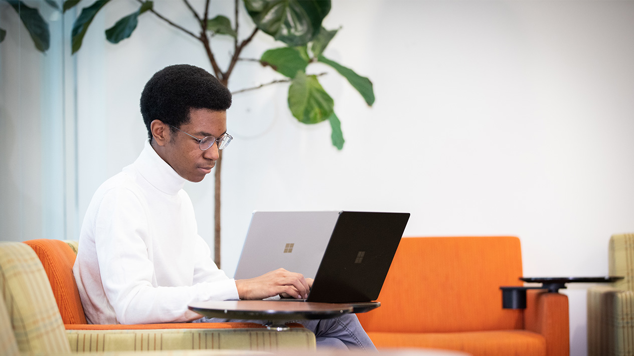 Student taking an online class through the Olin School of Business