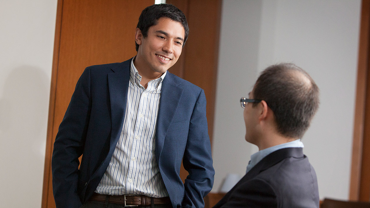 Student and mentor discussing Olin's Pre-Doctoral program