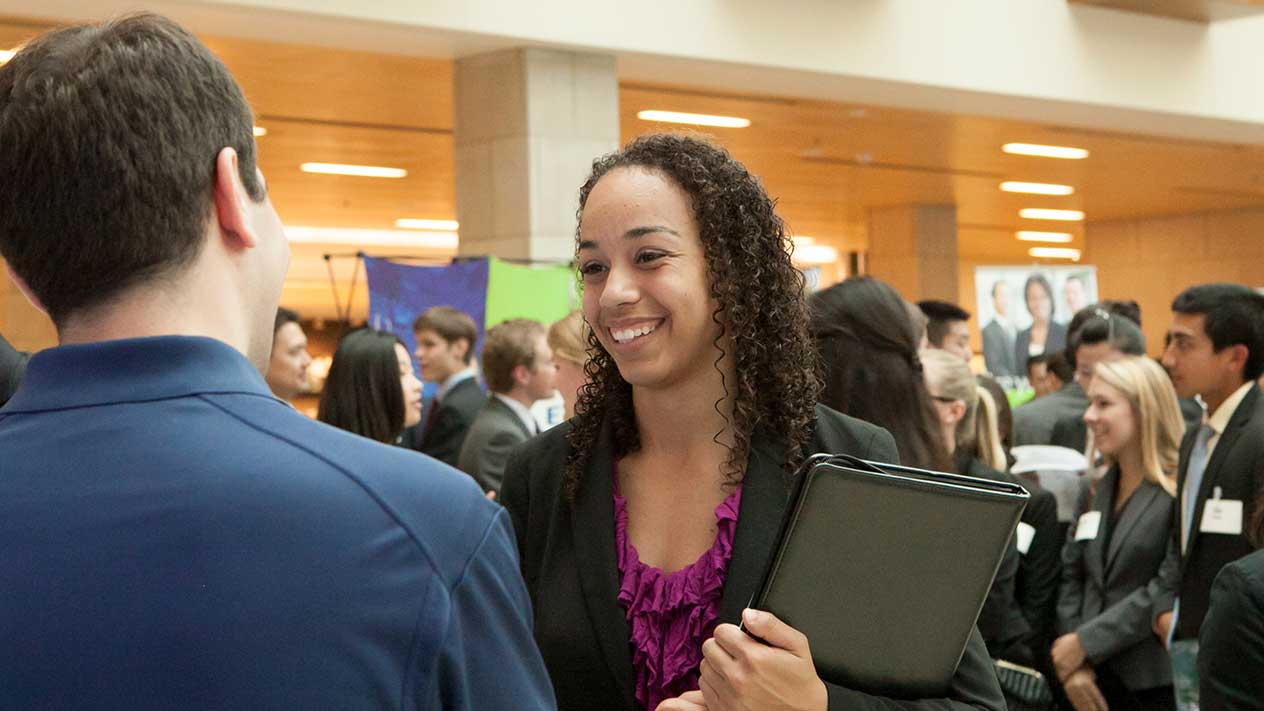 An Olin student attending a job fair event