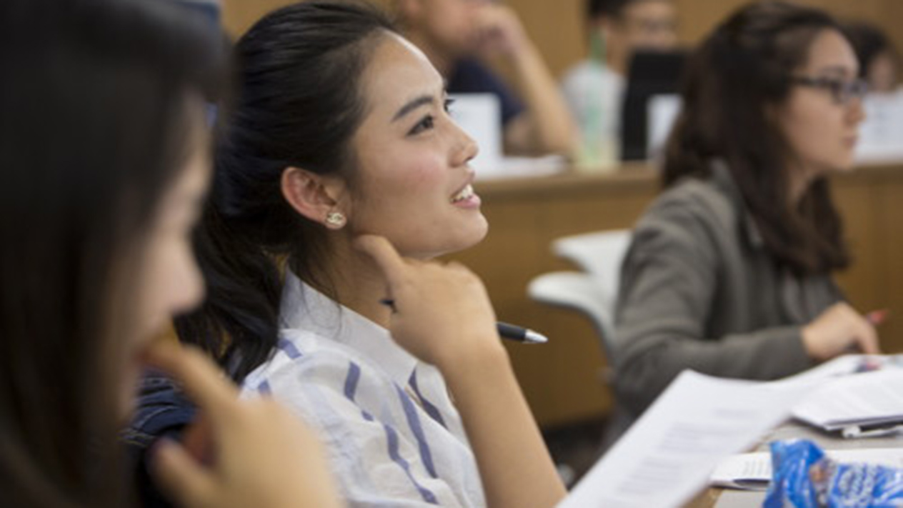 A WashU Olin student in a class for the MS in Analytics program