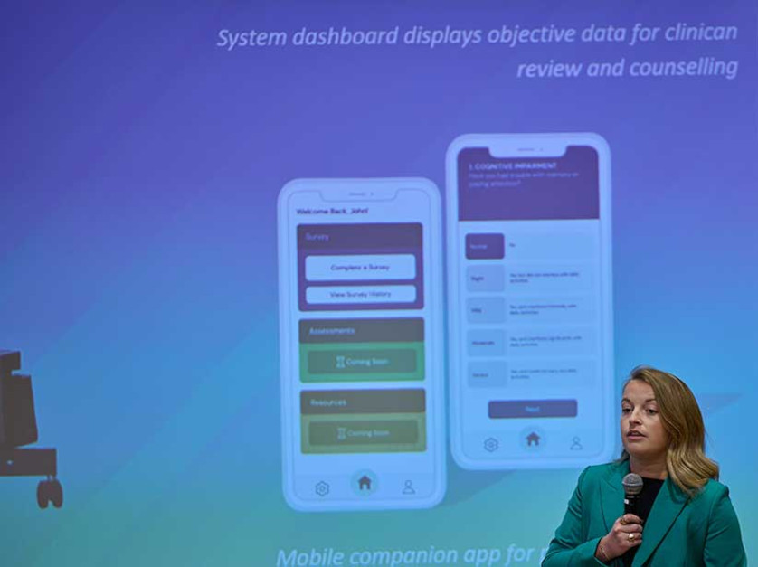 MBA student presenting on stage
