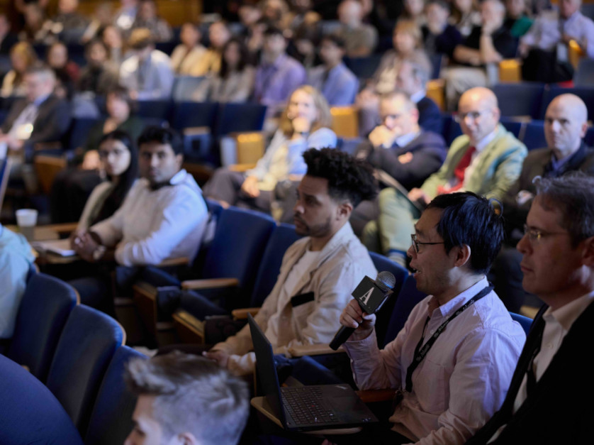 An audience member asks a question during The Atlantic - WashU Olin Business of Health Summit.