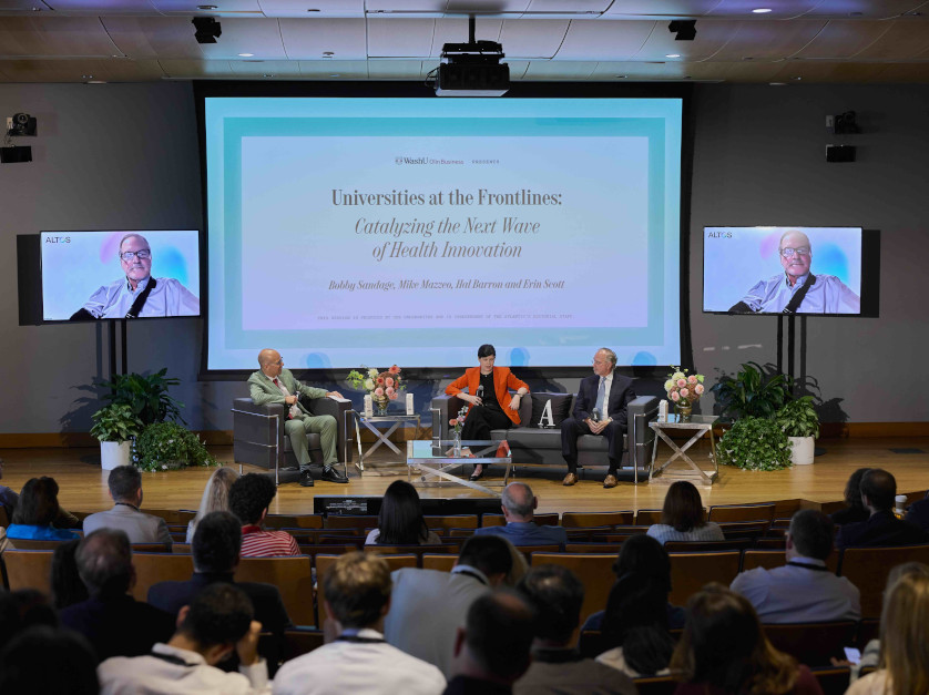 Erin Scott speaks during the "Universities at the Frontlines" segment of the program.