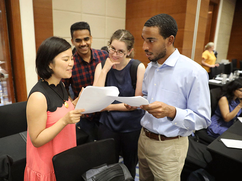 MBA students collaborating on a class project