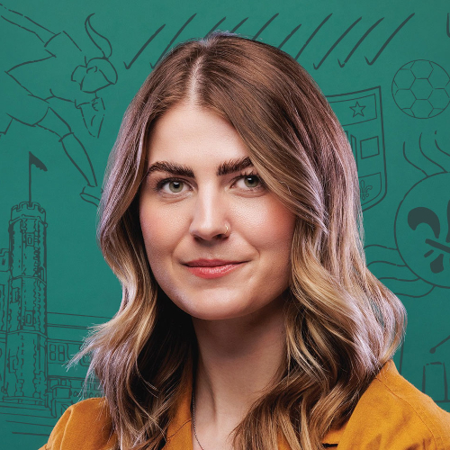 Livi smiling in front of green screen