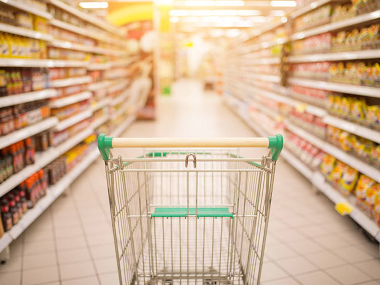 Photo of a shopping cart in a supermarket - stock photograph