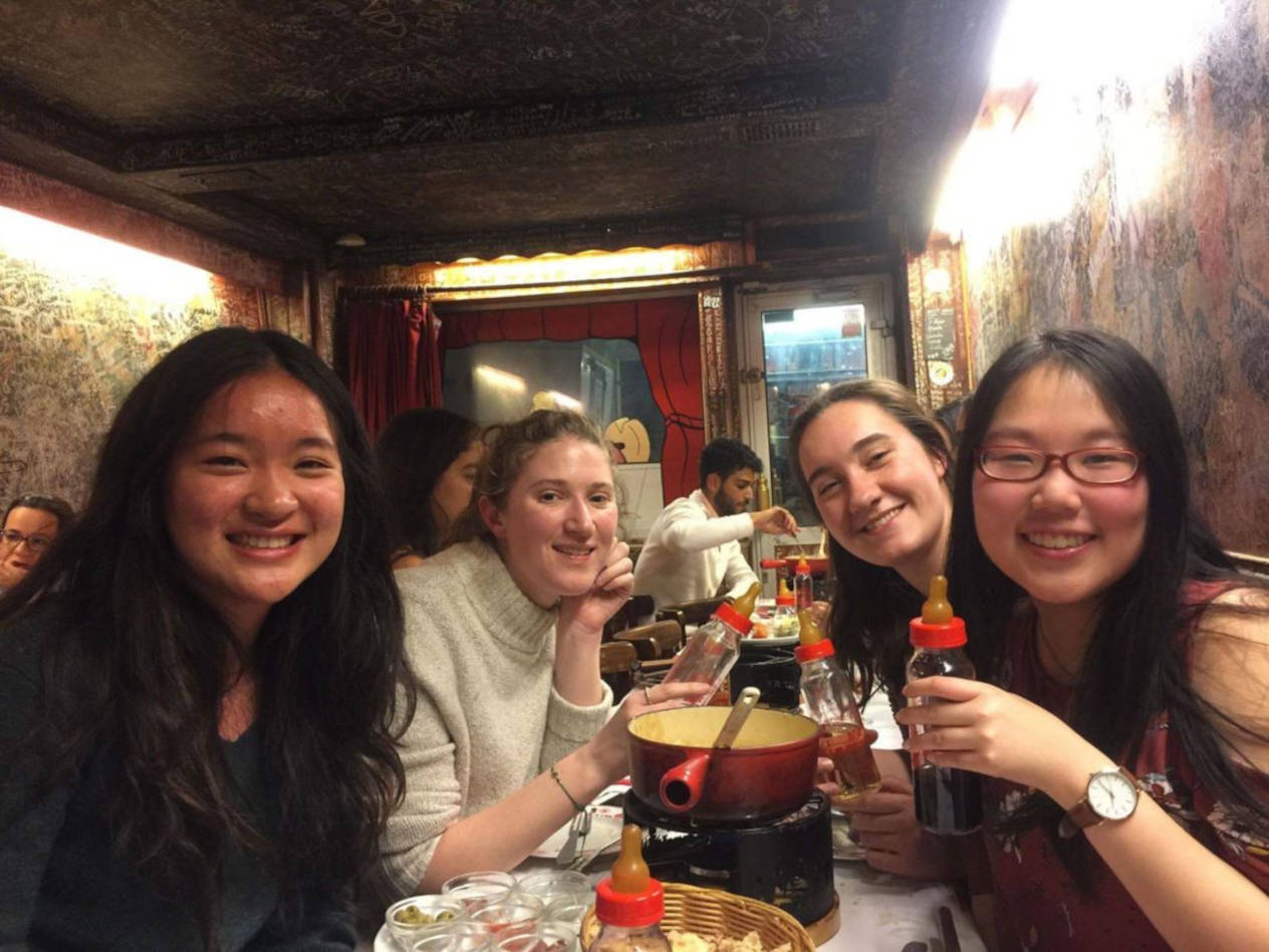 Cheese fondue with friends from the IFE program at Le Refuge des Fondus. Danni Yang at right.