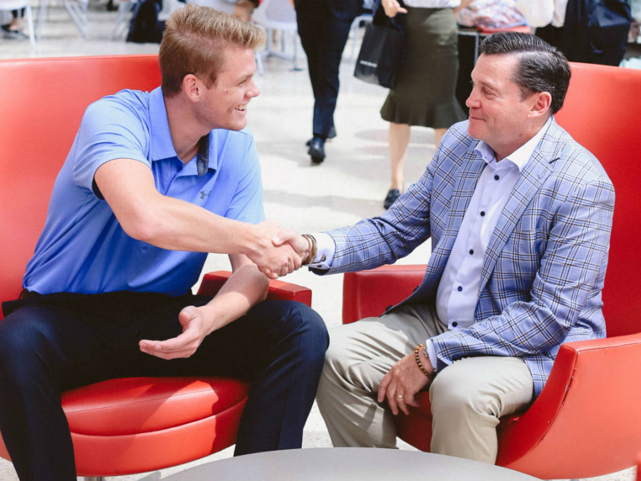 Scholarship donor Neil M. Yaris, BSBA’86, meets with the latest recipient of the Neil Marshall Yaris Scholarship, Hank Hunter, BSBA’20.