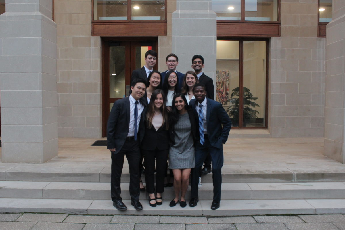 Julie pictured with members of her professional fraternity, Delta Sigma Pi.