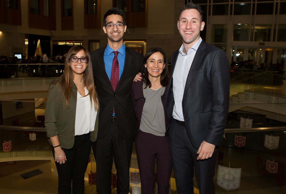 Jen Flaxman, MSW 2020; Aman Grover, BSBA 2021; Lauri Flaxman; and Brian Flaxman, BSBA 2012.