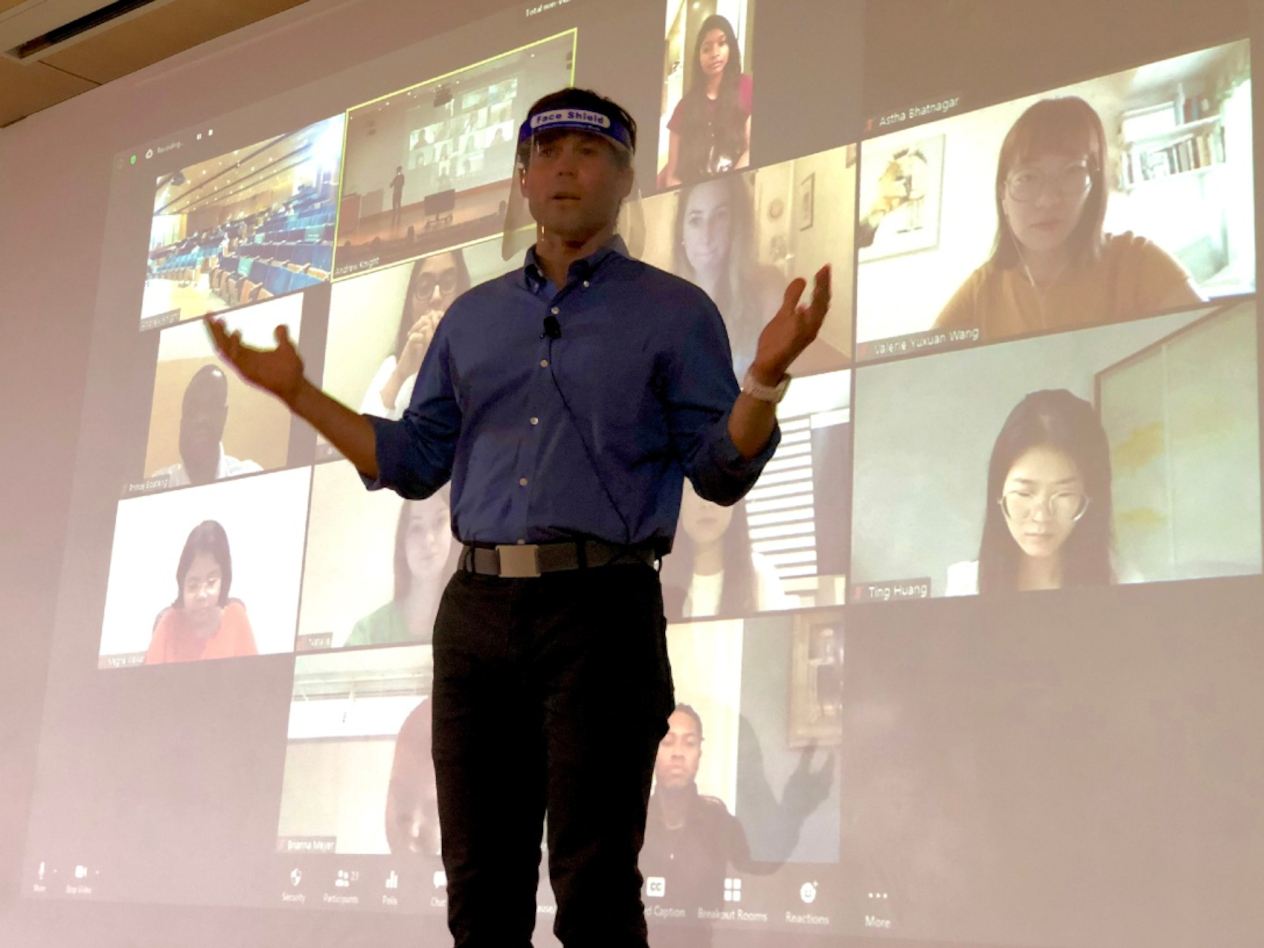 Professor Andrew Knight teaches a hybrid course in Emerson Auditorium.