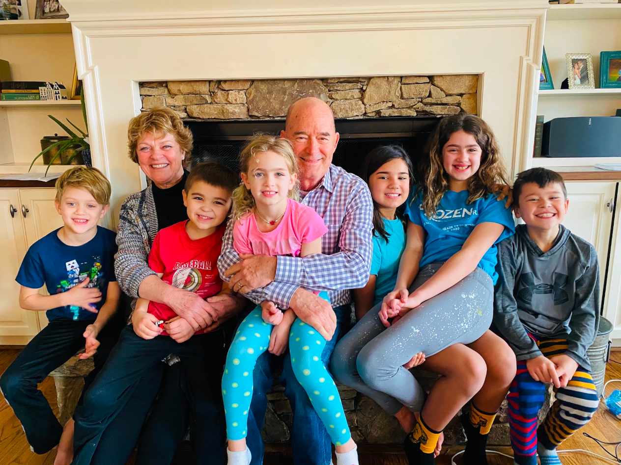 Frans VanOudenallen and his wife, Jean, with six of their 15 grandchildren.