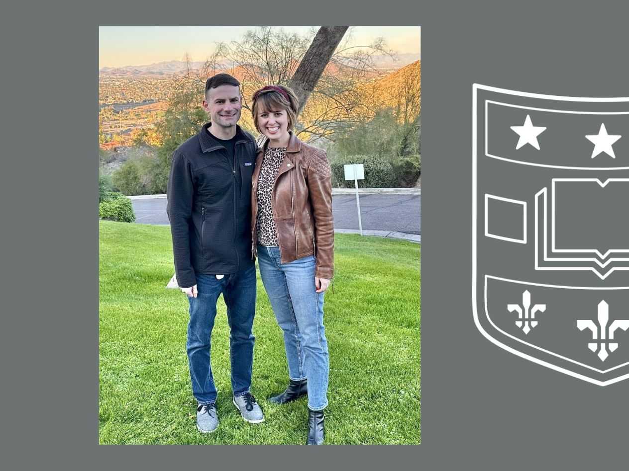 Karissa Rusu stands with her husband, Ciprian