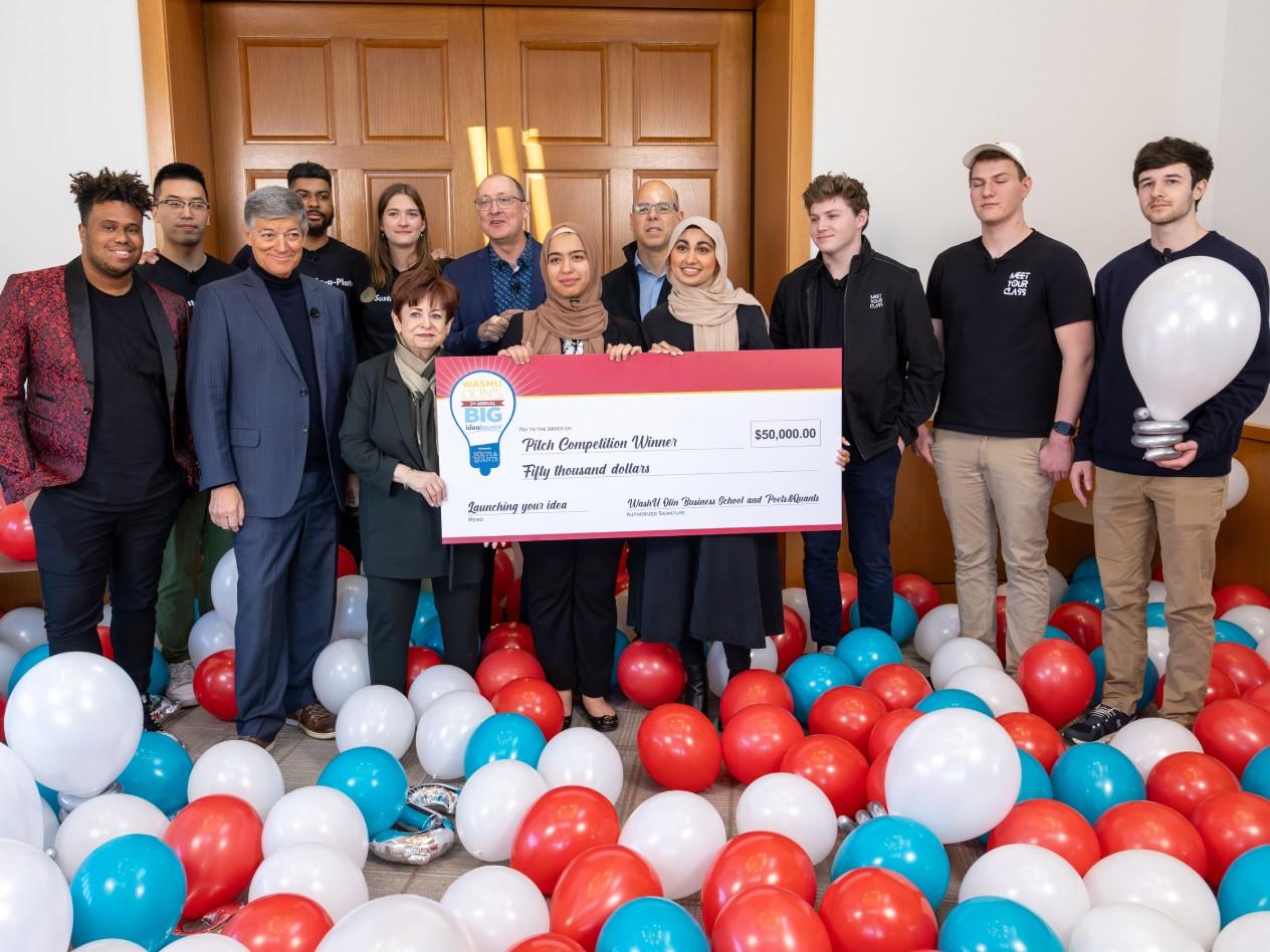 Competitors and participants after the balloon drop at WashU Olin's BIG IdeaBounce