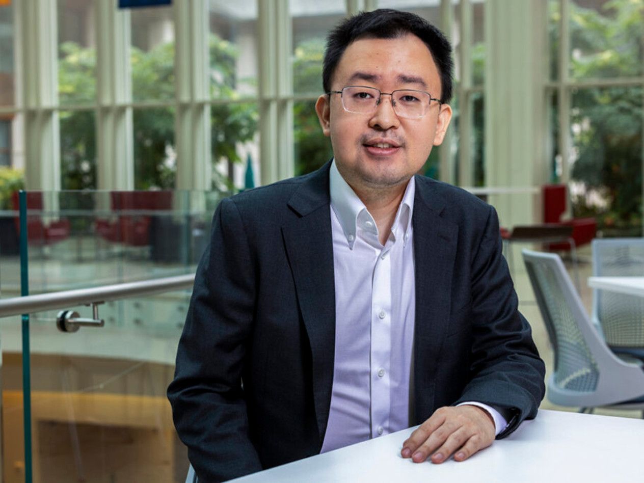 Olin Professor Dennis Zhang