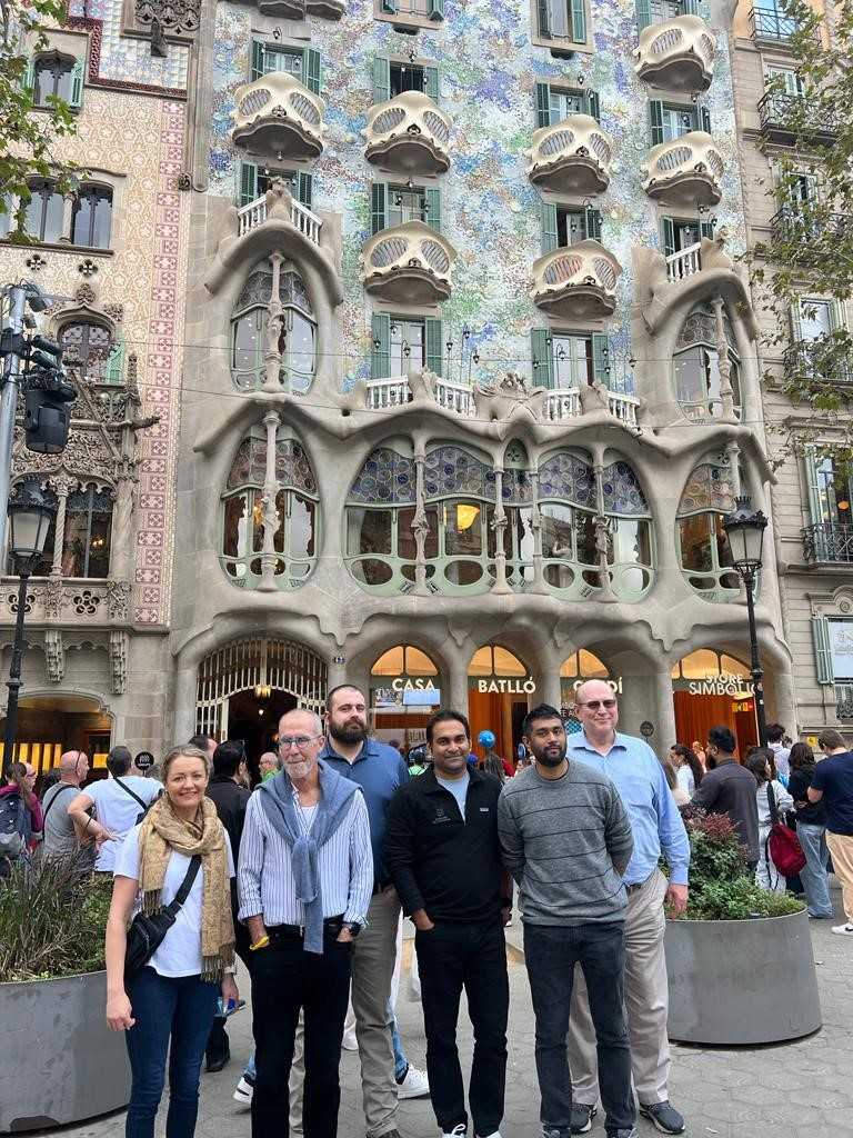 Students standing in front of a building in Spain