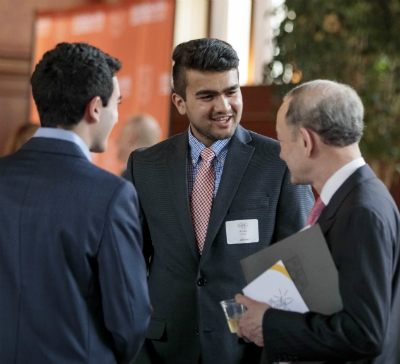 Arnav Kannan speaking with Chancellor Wrighton at the 2019 Skandy Awards.