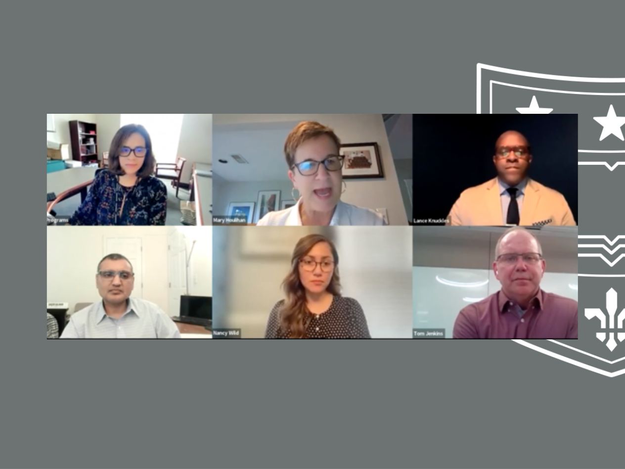 A panel discussion with six participants