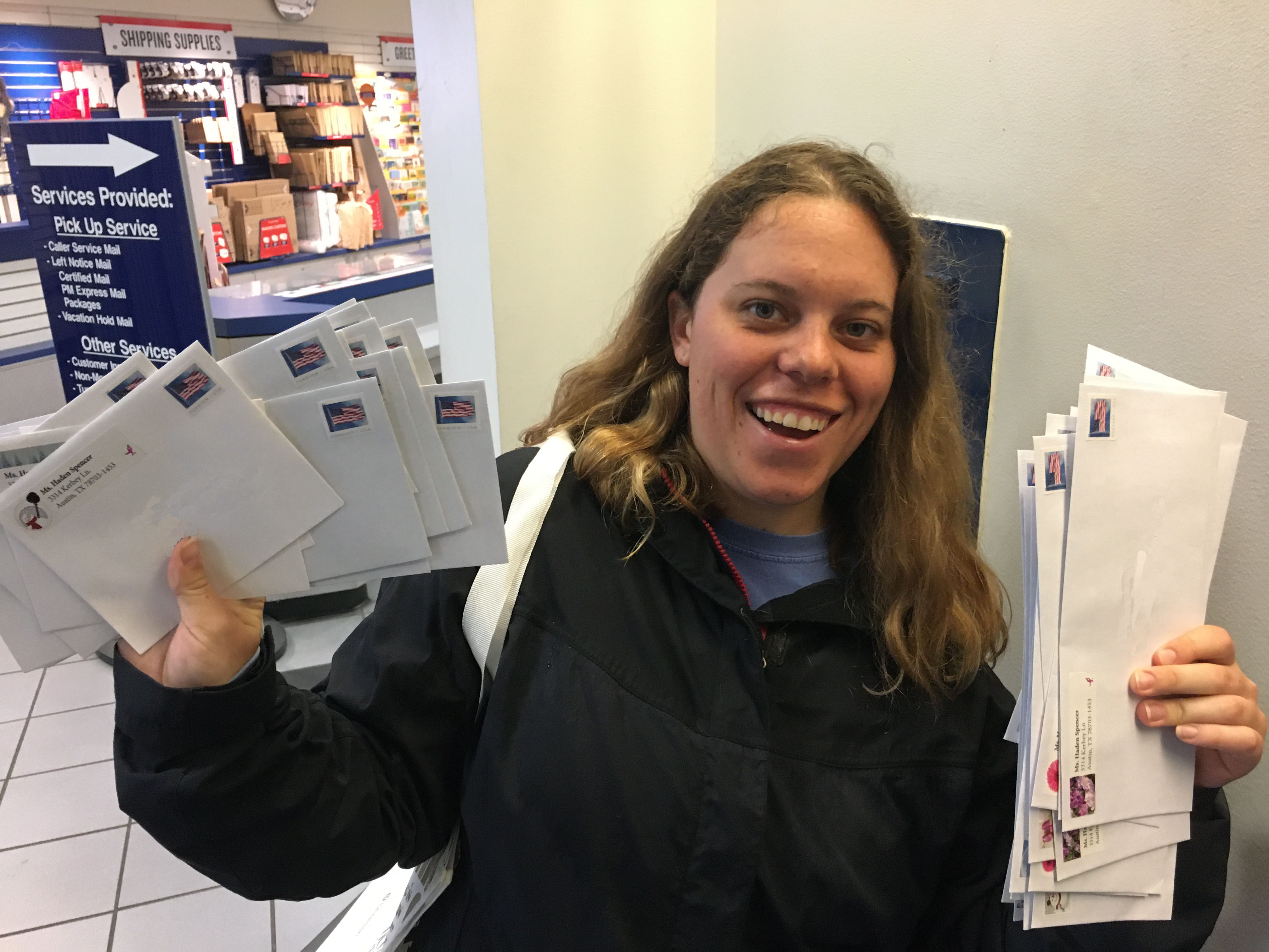 Katherine gets ready to mail checks to restaurant workers based on tips provided through the Crested Butte Tip Jar.