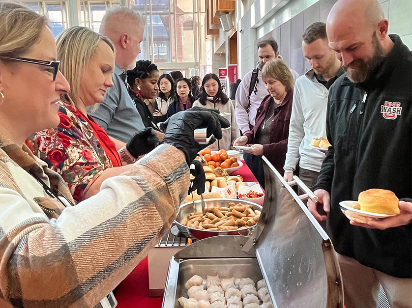 people getting buffet food
