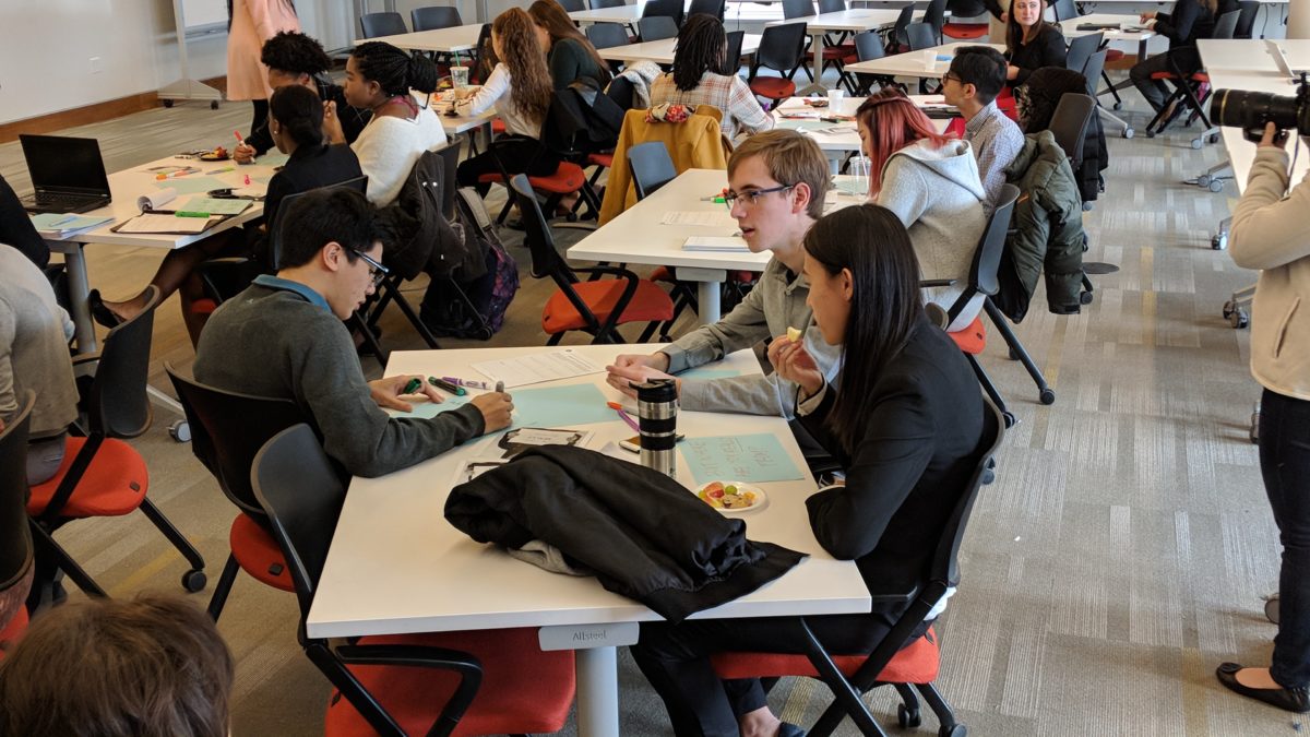 Students brainstorming in the D&I Summit’s micro aggression session.