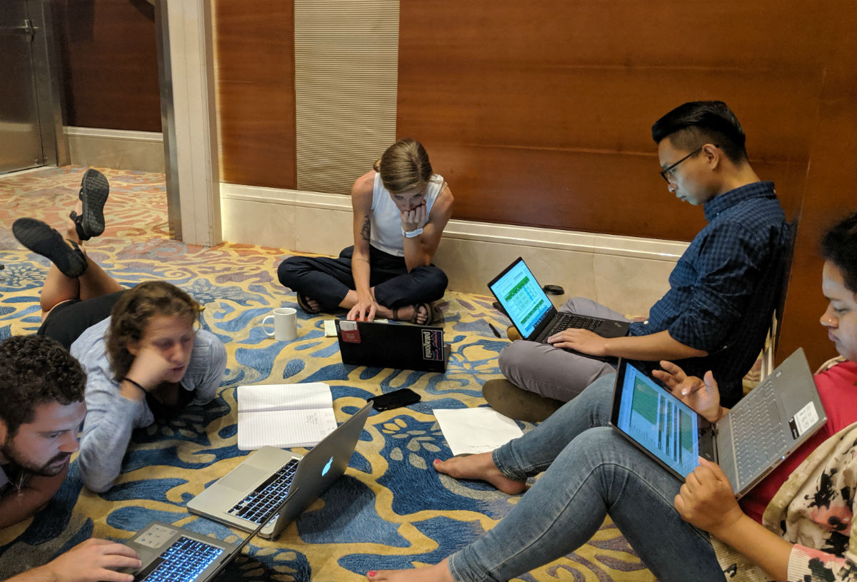 MBA students in the global immersion developing a strategy for the next round of a retail computer simulation they ran during their second day in Shanghai.